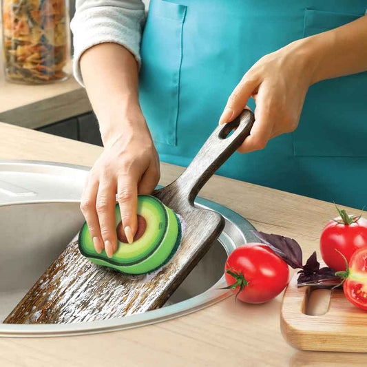 Woman cleaning with Just Ripe Kitchen Sponge