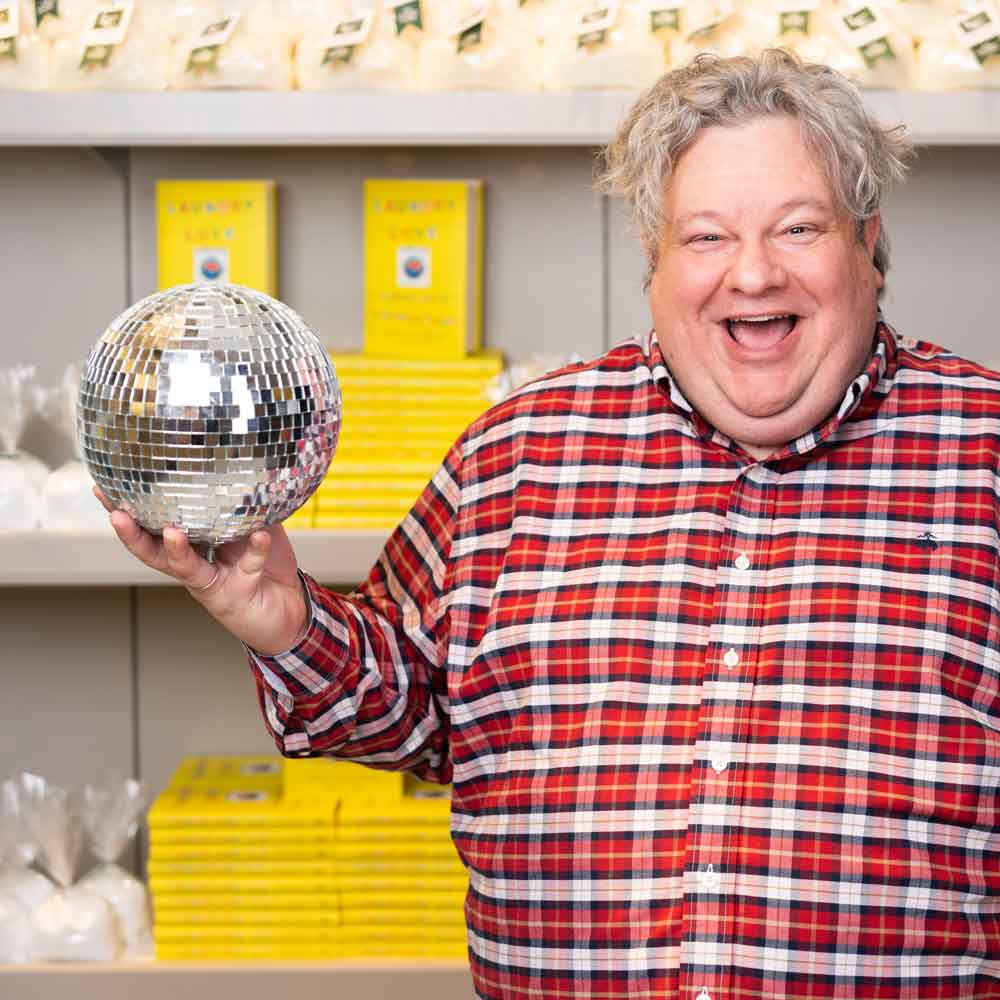 Patric richardson holding disco ball